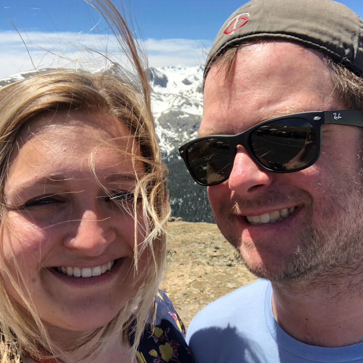 Hannah and Erik taking a selfie in the Rocky Mountains