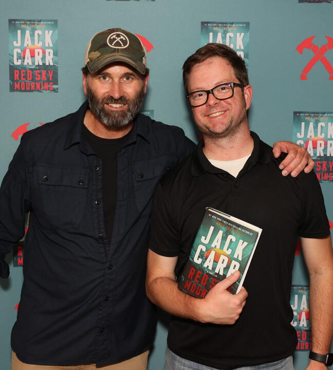 Erik meeting author Jack Carr at a book event