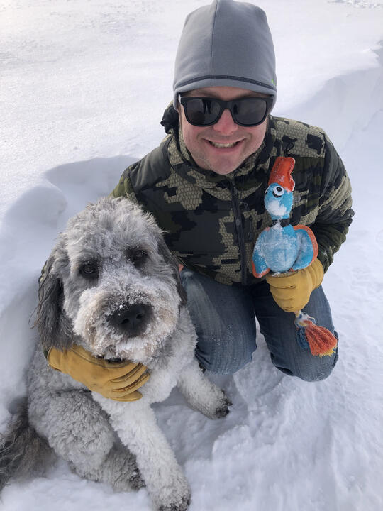 Erik and Bonnie enjoying a snowy winter day outdoors