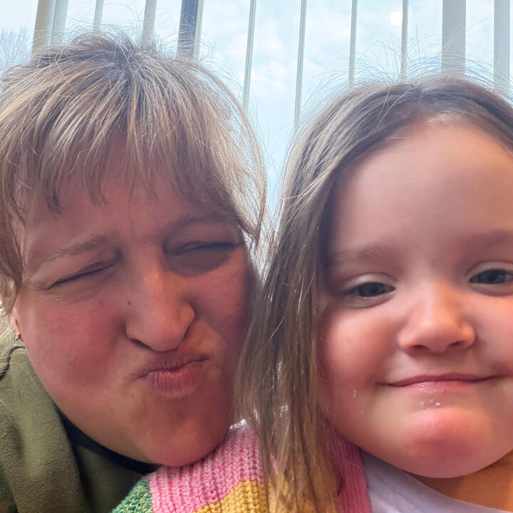 Hannah and her young niece making silly faces together during a fun family morning