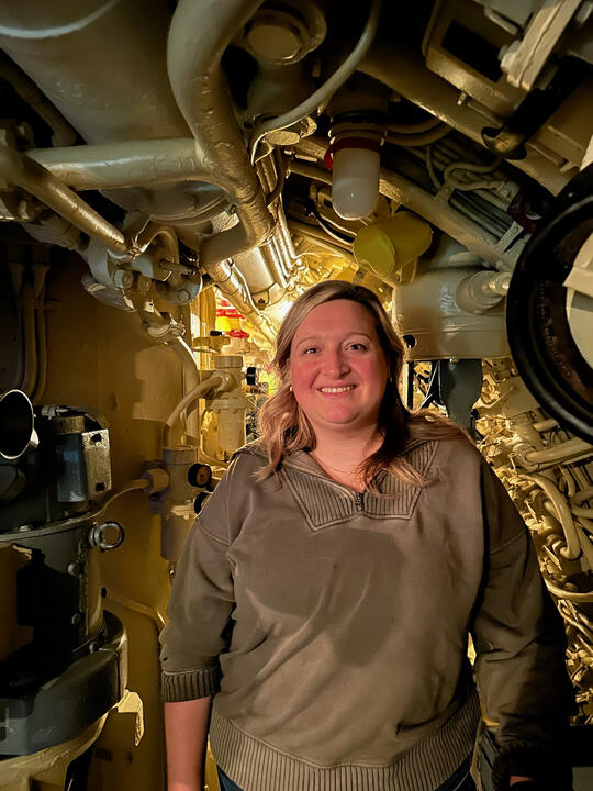 Hannah exploring a submarine museum exhibit