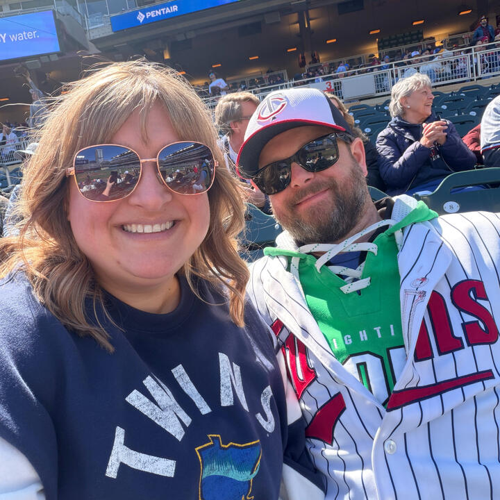 Hannah and Erik at a baseball game