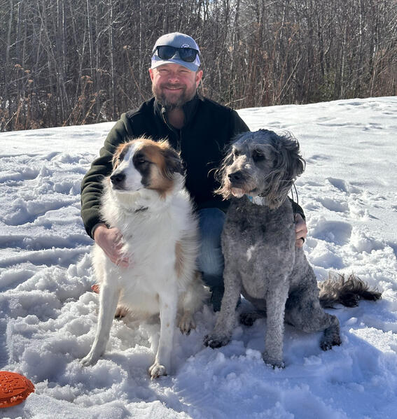 Erik with Bernie and Bonnie, taking a break from playing frisbee